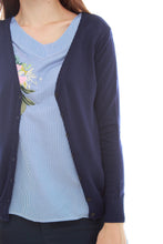 women blue cardigan